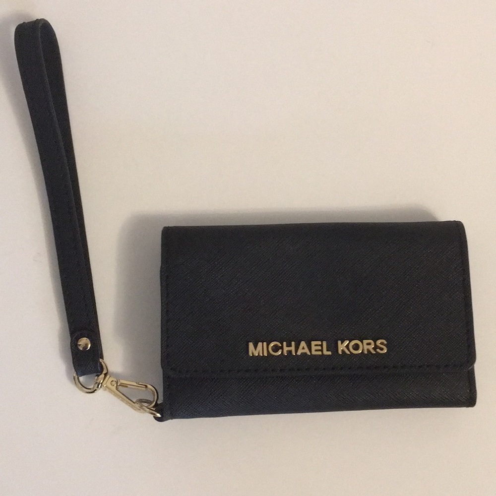 Michael Kors wristlet - built in phone holder.